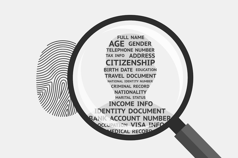 A magnifying glass focuses on a fingerprint and a silhouette filled with words like "Citizenship," "Address," and "Bank Account Number," representing personal identification, data privacy, and the need to block truthfinder-style data exposure.
