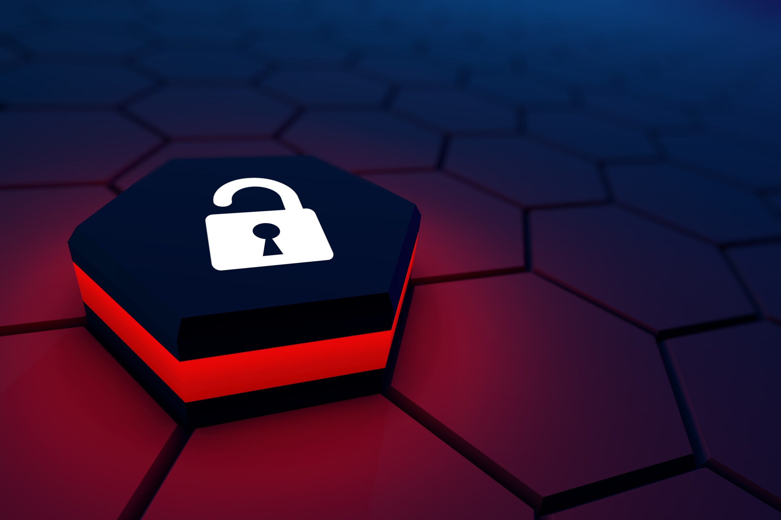 A hexagonal block with a white unlocked padlock symbol sits on a red and black honeycomb pattern surface, symbolizing cybersecurity or data breach. .