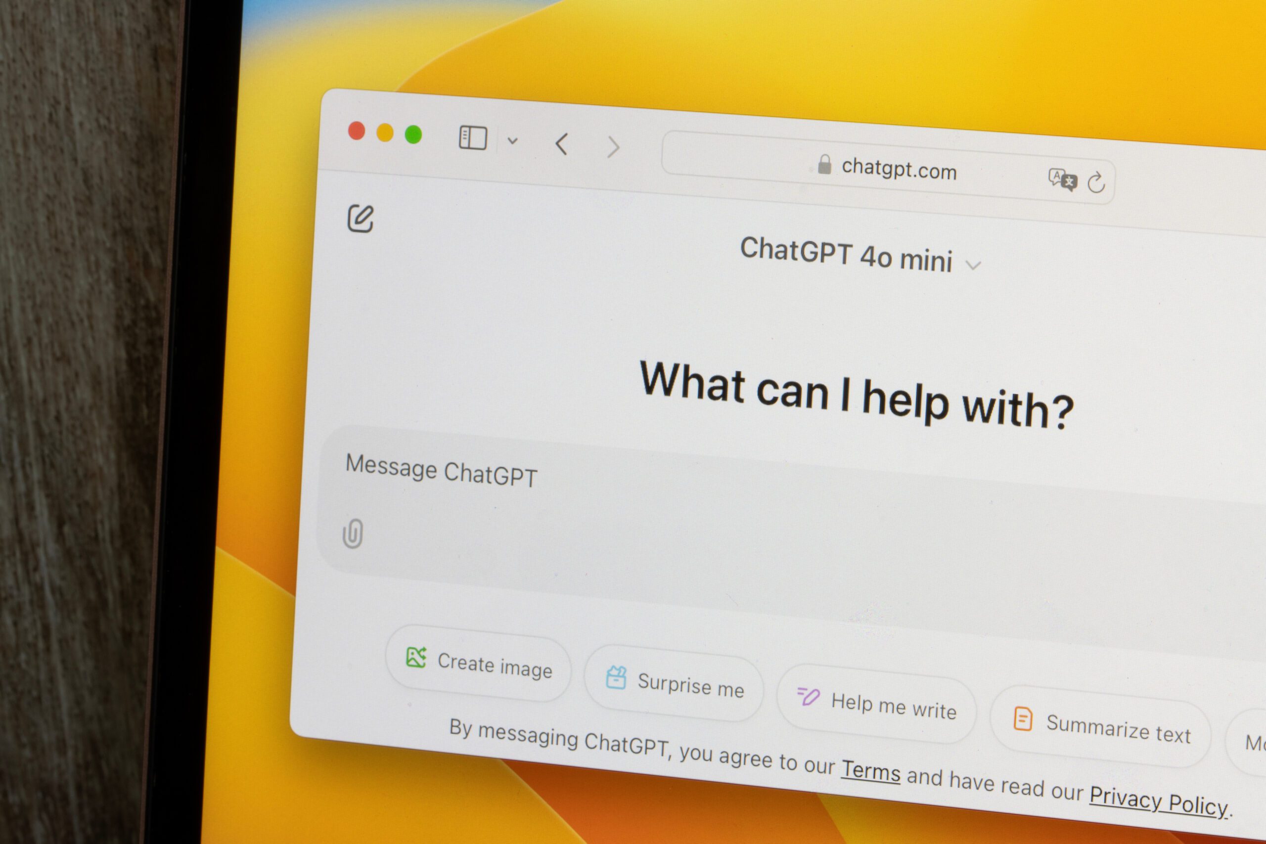 A computer screen displays the ChatGPT 4o mini interface with the prompt "What can I help with?" and options to create an image, get a surprise, write help, or summarize text. The URL shown is chatgpt.com.