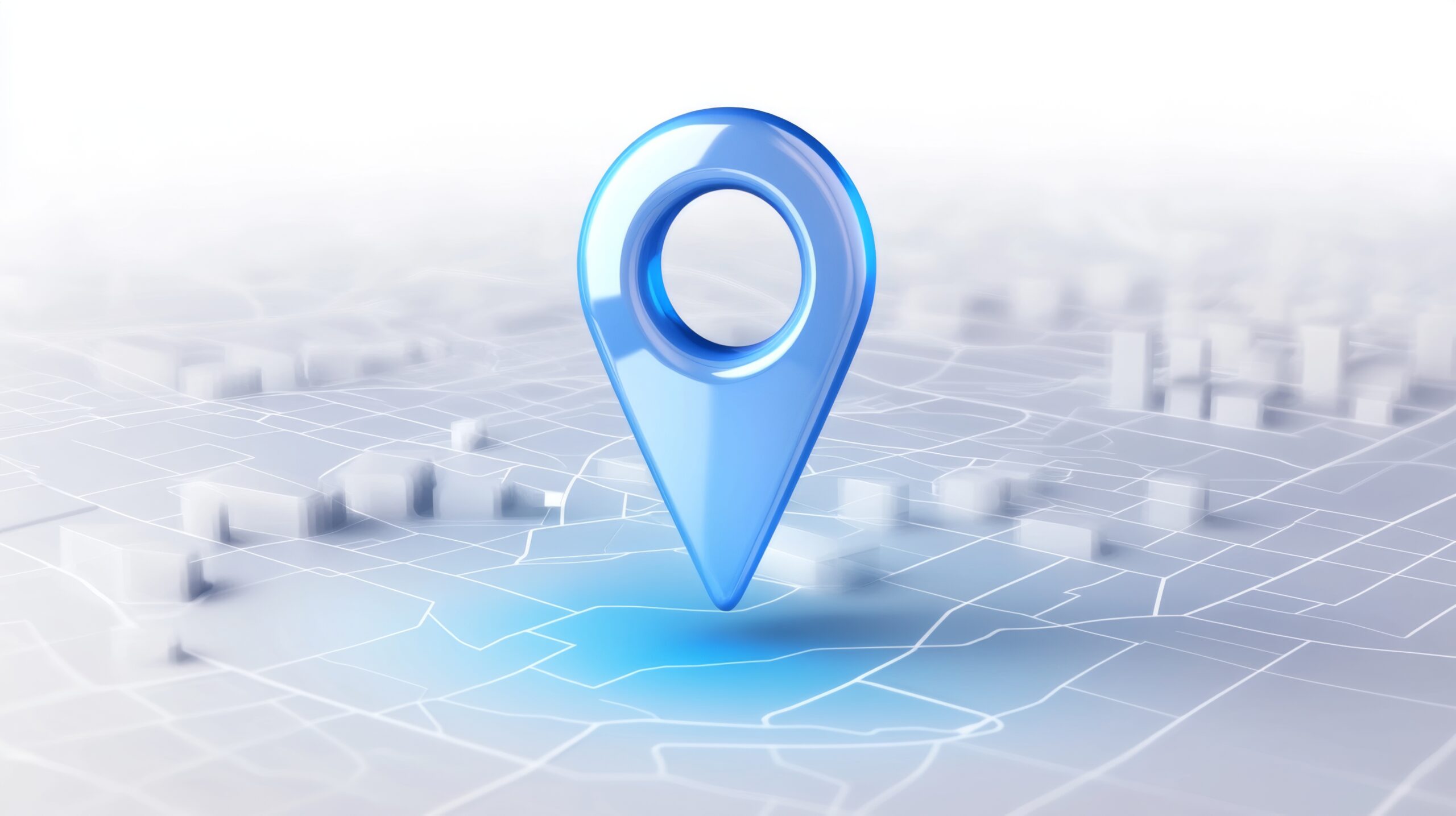 A large, blue location pin marker stands on a blurred, abstract city map with faint buildings in the background, symbolizing navigation or geolocation.